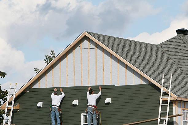 Professional Siding Replacement technician working in Beach City, TX